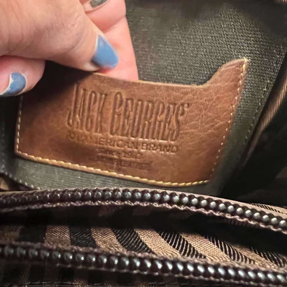 Jack George’s brown leather back pack